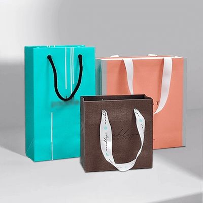 Kantong belanja ramah lingkungan putih Kantong kemasan kertas kraft khusus