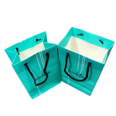 Tas belanja hadiah kertas hijau matte mewah untuk kemasan pakaian