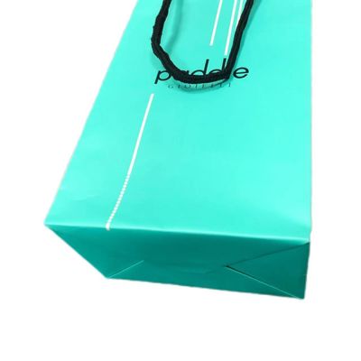 Tas belanja hadiah kertas hijau matte mewah untuk kemasan pakaian