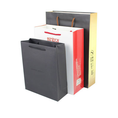 Kantong belanja kertas khusus yang didaur ulang dengan pegangan laminasi matte / mengkilap