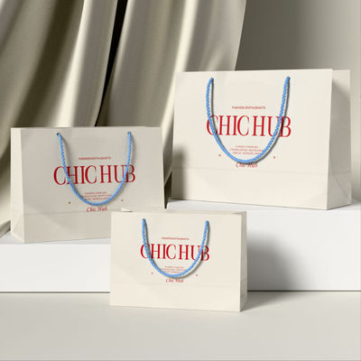 Tas belanja pakaian khusus Kemasan Mewah Papan Gading Kraft Kertas Harga Murah Tas belanja hadiah Logo khusus