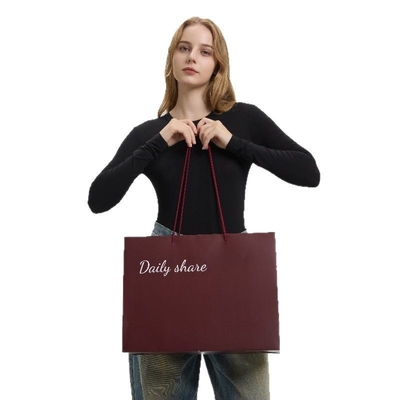 Tas Belanja Kertas Besar Elegan Kustom Gaun Desain Logo Pribadi Daur Ulang Mode Massal Mewah Bermerek Tas Jinjing Untuk Toko