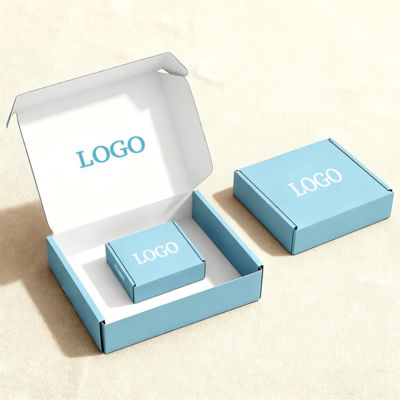 Kotak Kertas Bergelombang Kustom Untuk Sepatu Pakaian Lipat Pesawat Pengiriman Dan Pengemasan Dengan Laminasi Glossy Sponge Liner